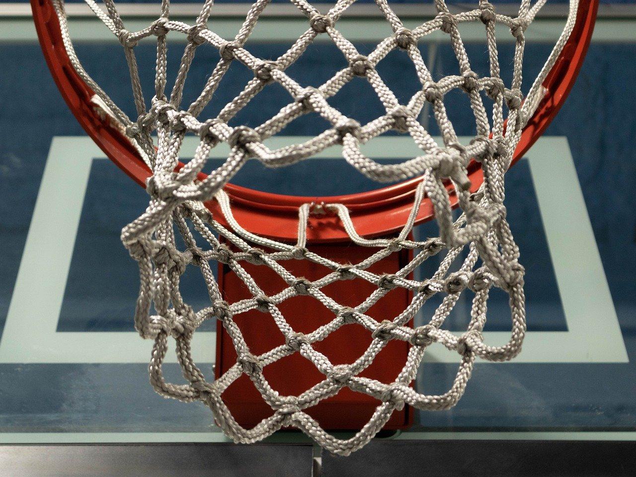 A close-up of a basketball hoopDescription automatically generated